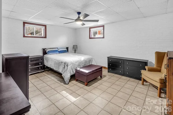 a bedroom with a bed and furniture