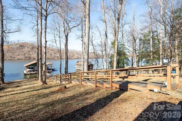 a view of swimming pool with chairs
