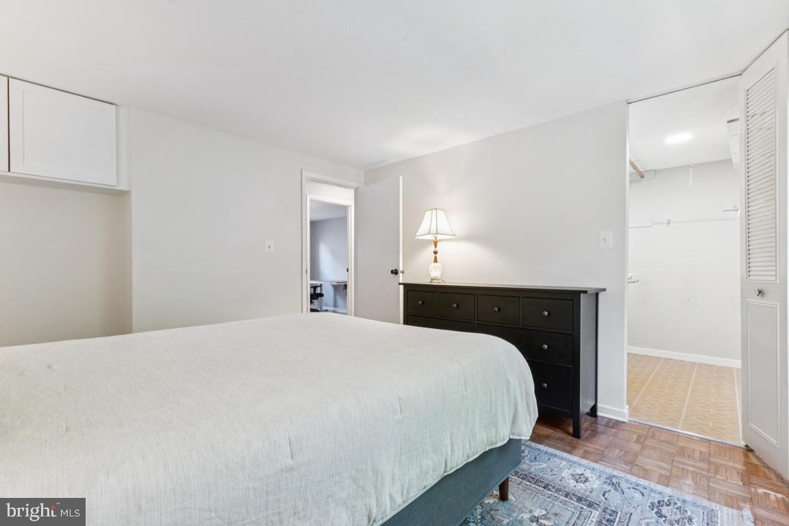 2269 Marginella Drive Reston, VA 20191 - Photo 13 of 29 a large bed in a white room with closet