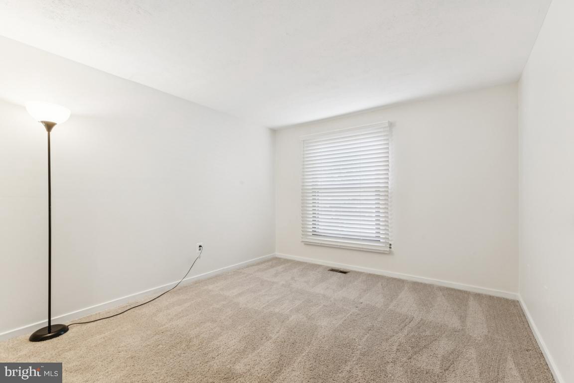 2269 Marginella Drive Reston, VA 20191 - Photo 15 of 29 a view of an empty room with a window