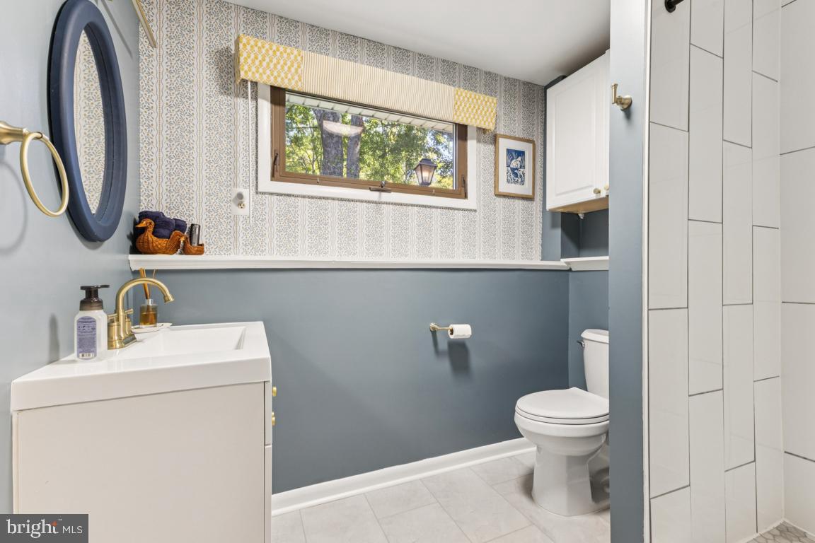 2269 Marginella Drive Reston, VA 20191 - Photo 18 of 29 a bathroom with a toilet sink and mirror