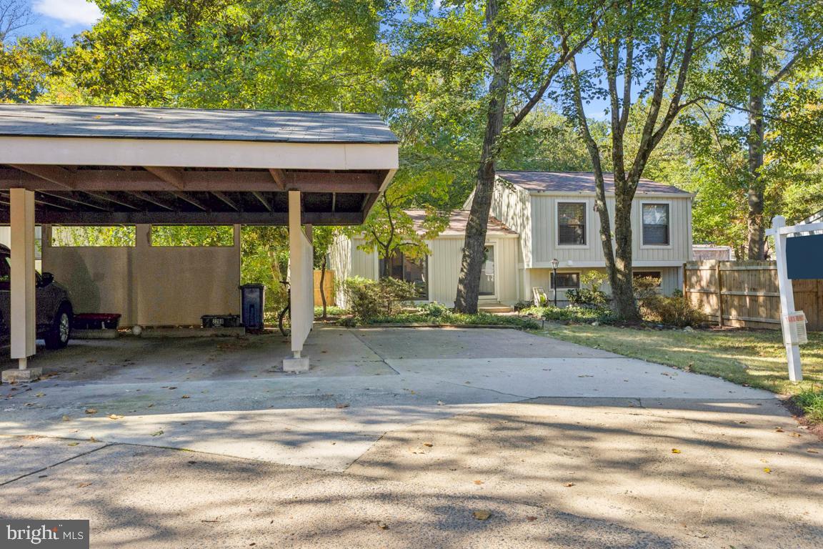 2269 Marginella Drive Reston, VA 20191 - Photo 2 of 29 a backyard of a house with barbeque oven table and chairs