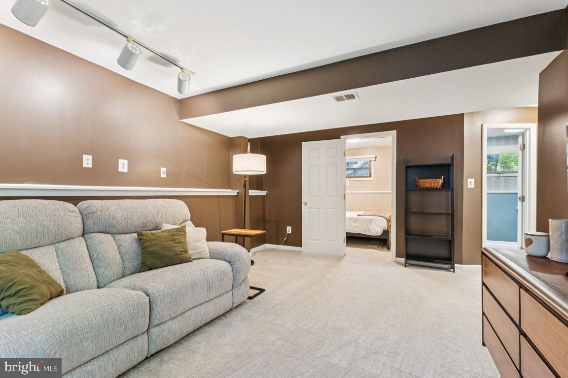 2269 Marginella Drive Reston, VA 20191 - Photo 21 of 29 a living room with furniture