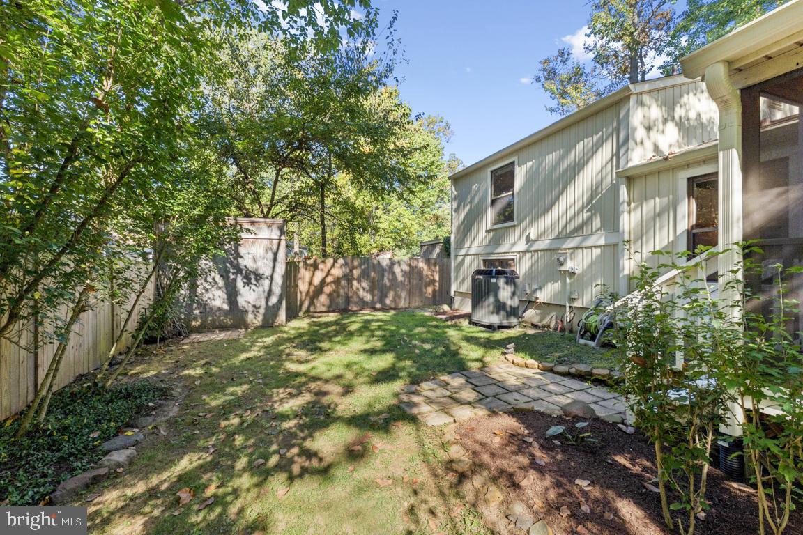 2269 Marginella Drive Reston, VA 20191 - Photo 24 of 29 a backyard of a house with lots of green space