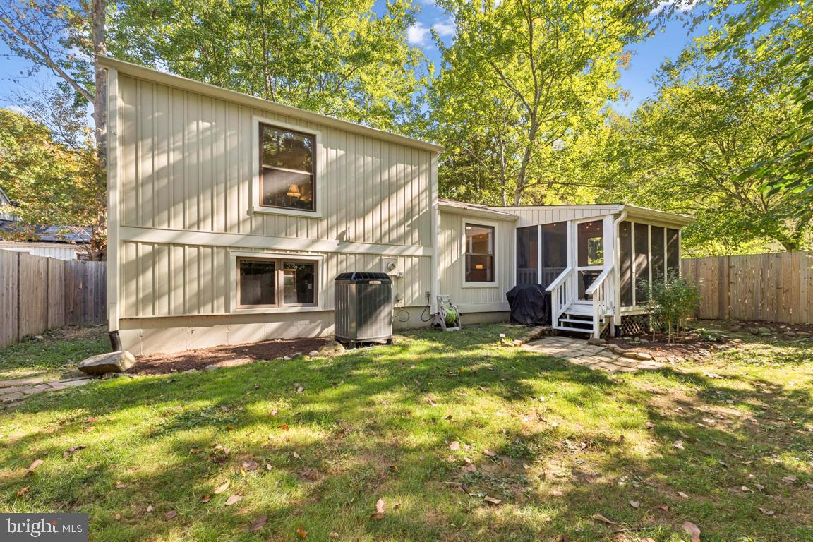 2269 Marginella Drive Reston, VA 20191 - Photo 25 of 29 a view of house with backyard and wooden fence