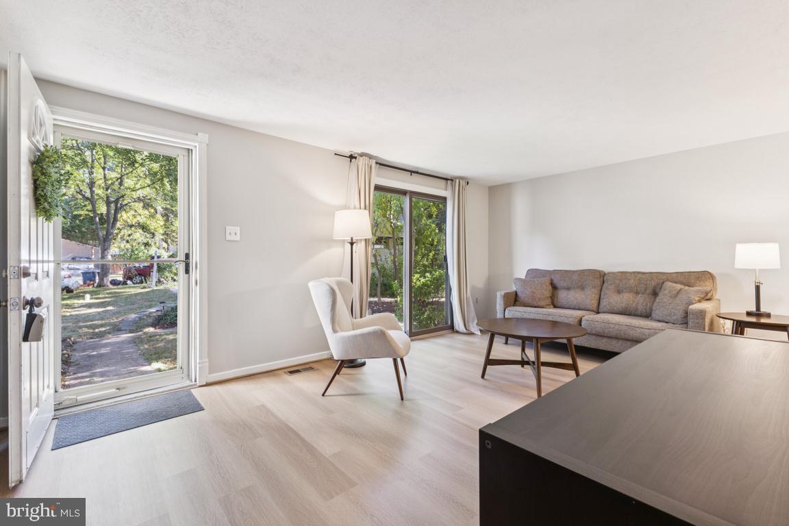 2269 Marginella Drive Reston, VA 20191 - Photo 5 of 29 a living room with furniture and a large window