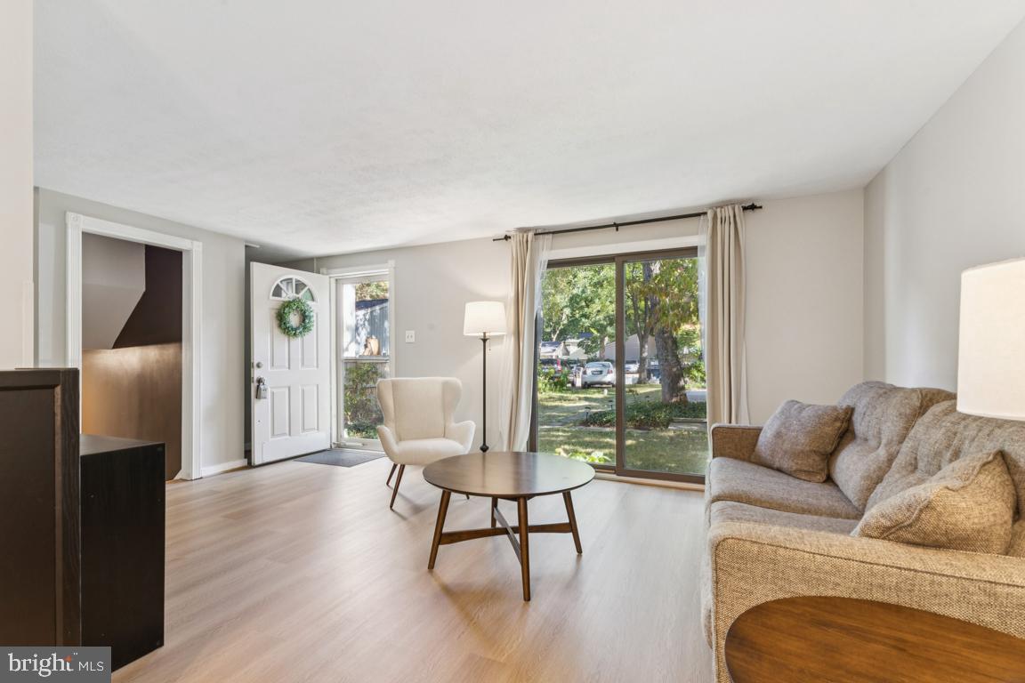 2269 Marginella Drive Reston, VA 20191 - Photo 6 of 29 a living room with furniture and a large window
