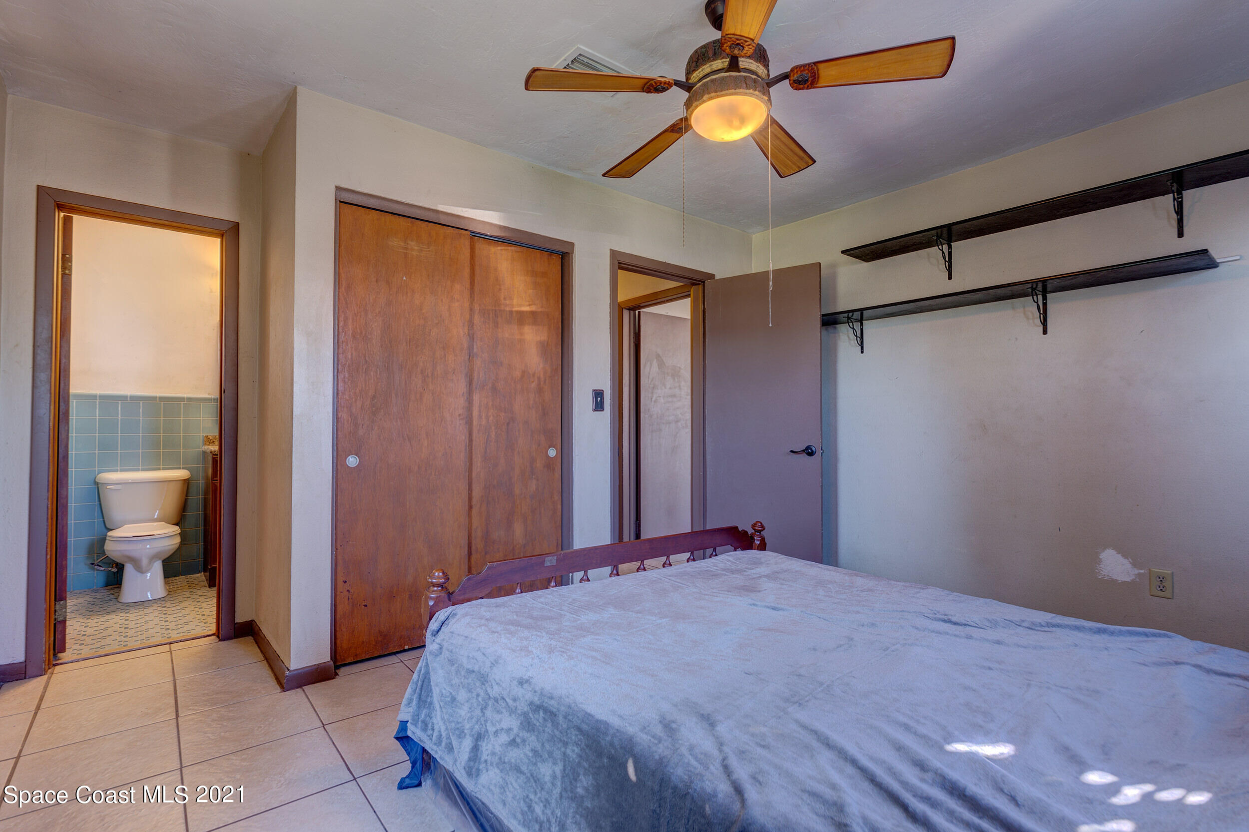 2975 Kosuth Road Northeast Palm Bay, FL 32905 - Photo 14 of 24 Primary Bedroom
