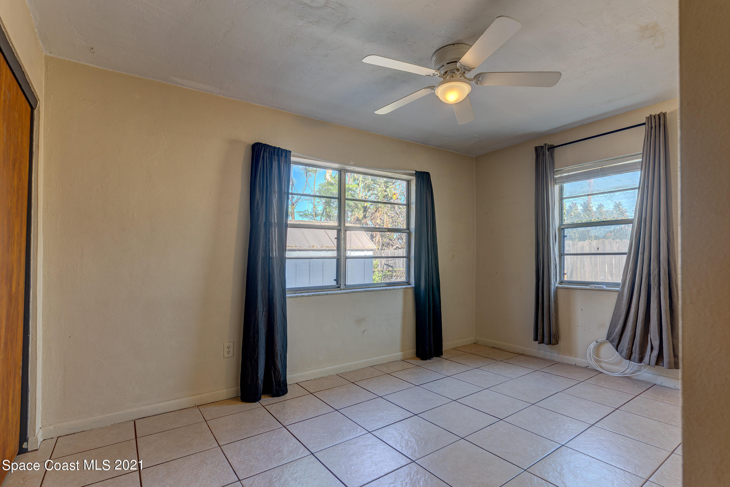 2975 Kosuth Road Northeast Palm Bay, FL 32905 - Photo 18 of 24 Guest Bedroom 2
