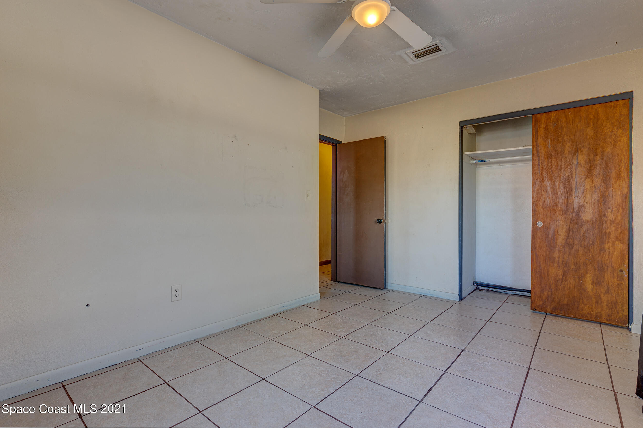 2975 Kosuth Road Northeast Palm Bay, FL 32905 - Photo 19 of 24 Guest Bedroom 2