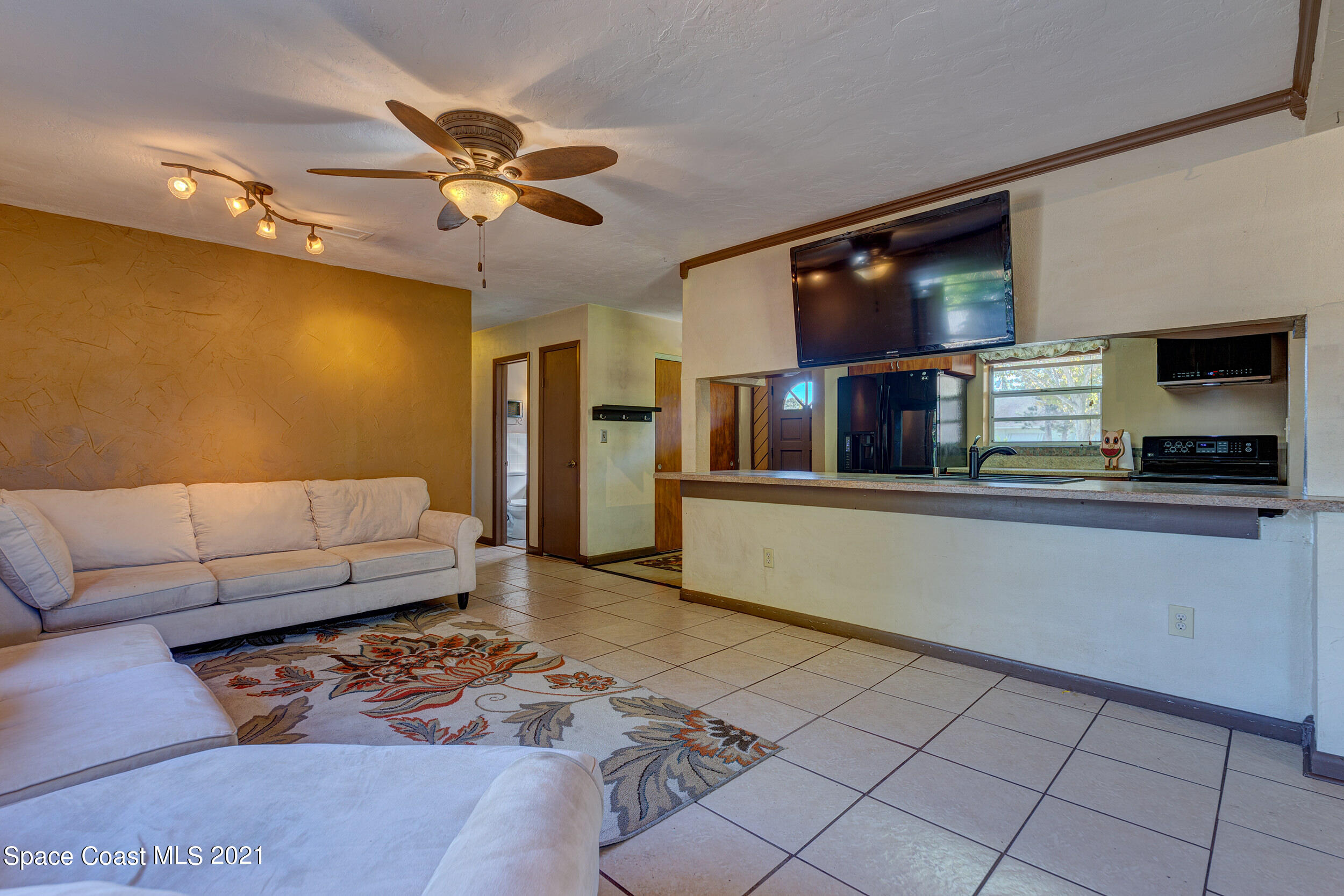 2975 Kosuth Road Northeast Palm Bay, FL 32905 - Photo 7 of 24 Family Room