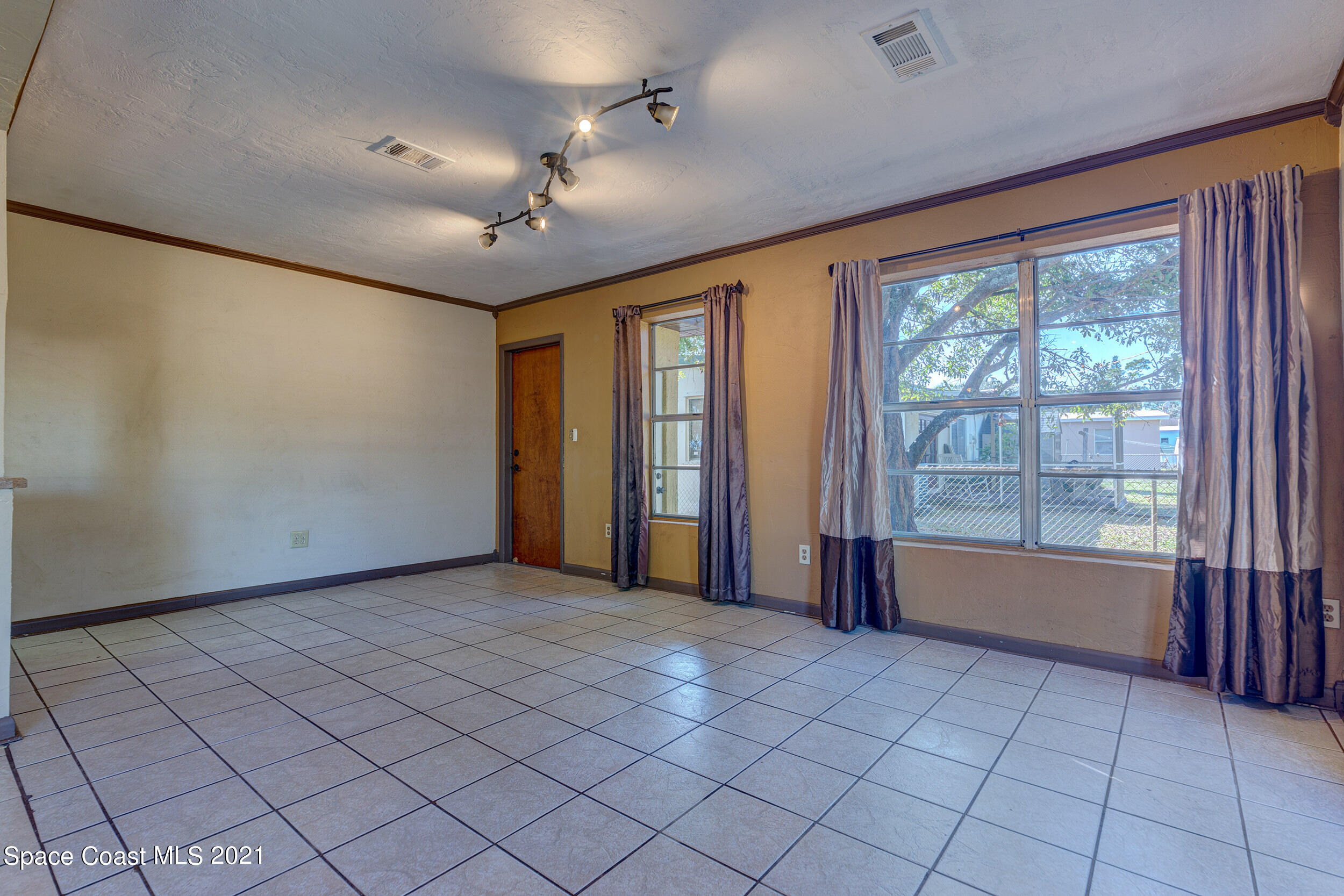 2975 Kosuth Road Northeast Palm Bay, FL 32905 - Photo 9 of 24 Dining Room