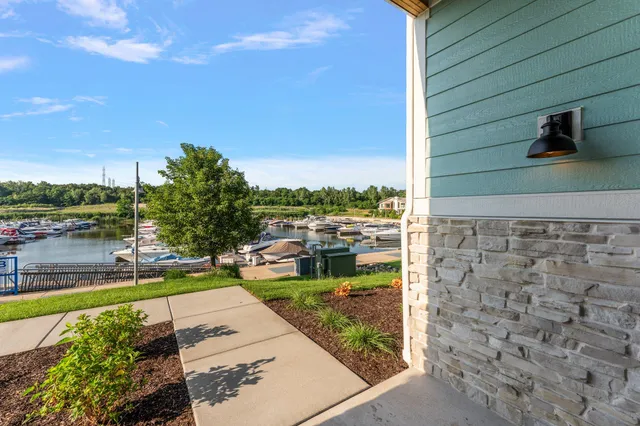 a view of a lake with a yard