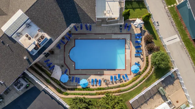 a view of swimming pool with outdoor space and seating area