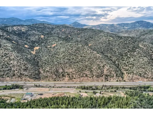 a view of a city with mountain