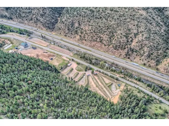 a black and white photo of a field