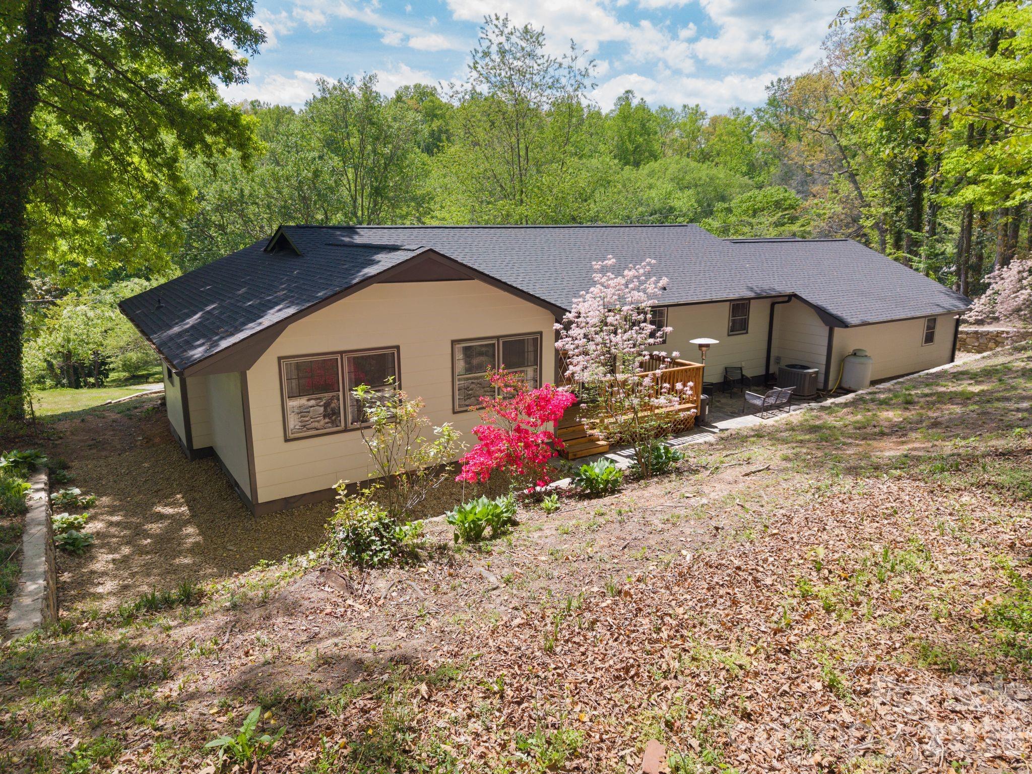 70 Melton Road Candler, NC 28715 - Photo 31 of 35 a front view of a house with a yard