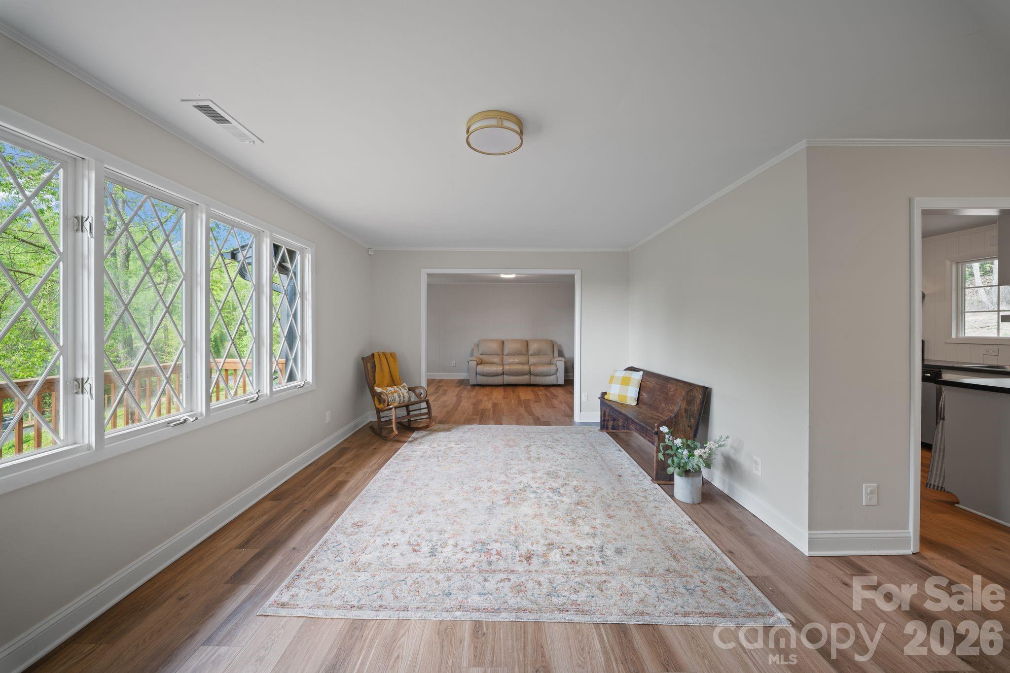 70 Melton Road Candler, NC 28715 - Photo 6 of 35 a bed room with a bed and a window