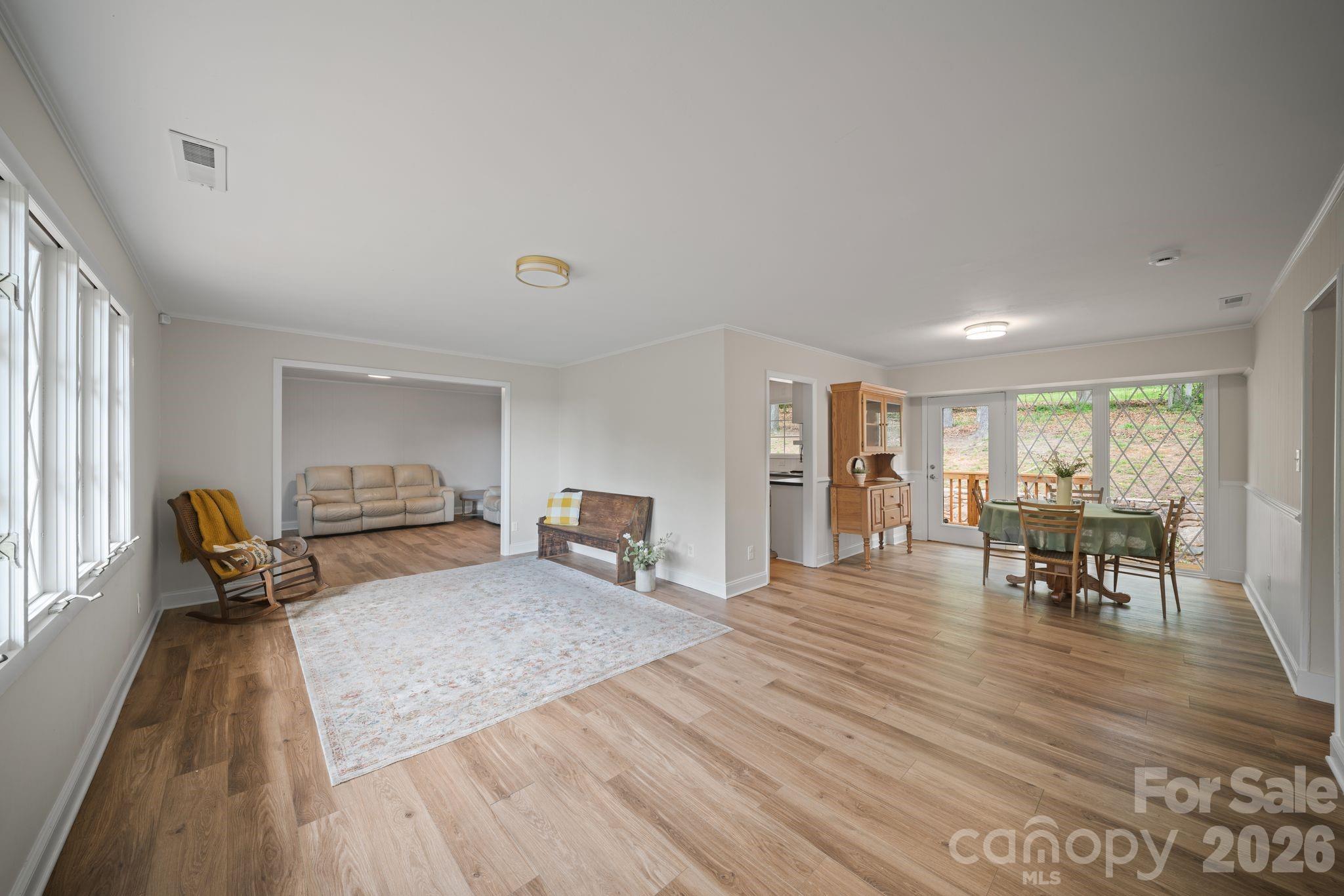 70 Melton Road Candler, NC 28715 - Photo 7 of 35 a living room with furniture and a table