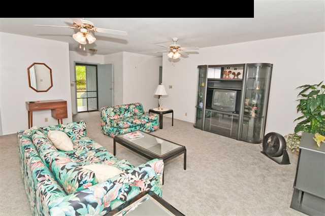 950 Akoa Place Haiku, HI 96708 - Photo 18 of 25 a view of living room filled with furniture