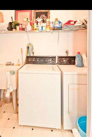 950 Akoa Place Haiku, HI 96708 - Photo 25 of 25 a utility room with dryer and washer
