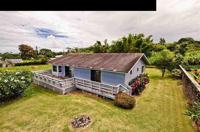 950 Akoa Place Haiku, HI 96708 - Photo 6 of 25 a aerial view of a house with swimming pool garden view and lake view