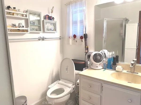a bathroom with a sink and a toilet