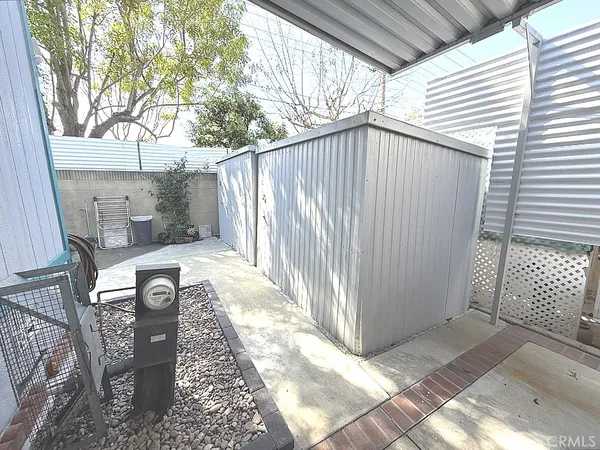 a view of a back yard of the house