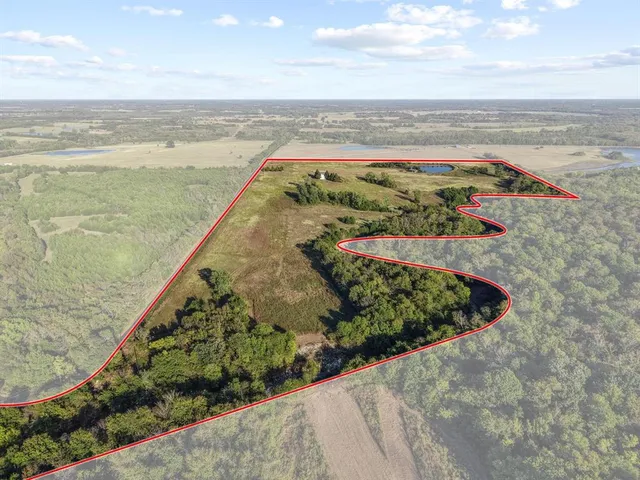 a view of a city and ocean