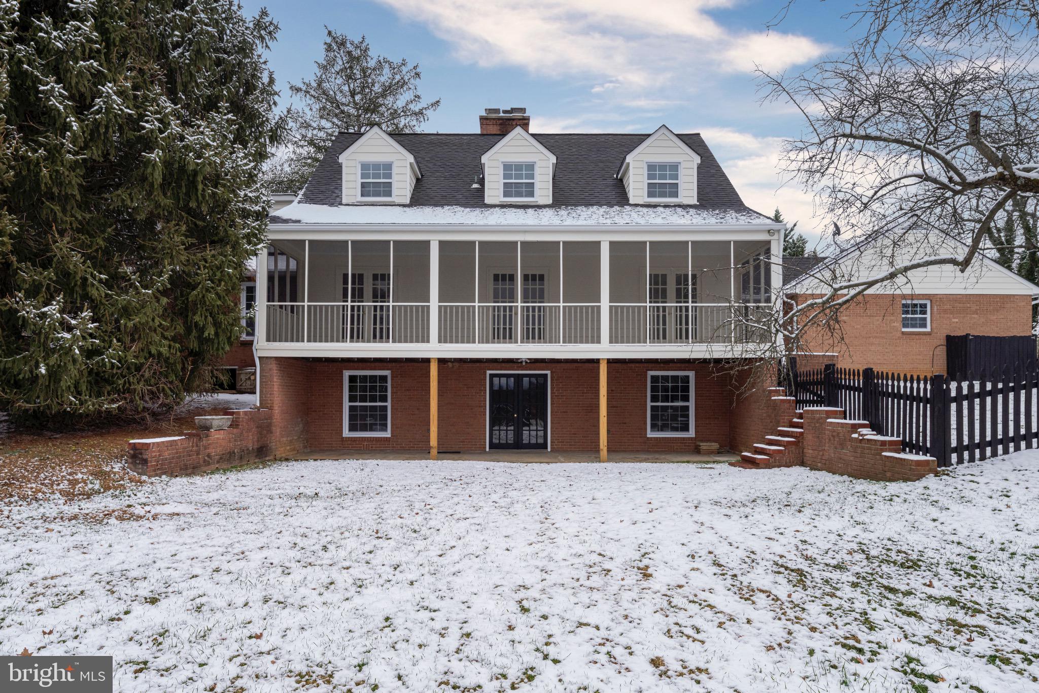 17747 Silcott Springs Road Purcellville, VA 20132 - Photo 2 of 42 a front view of a house with a yard