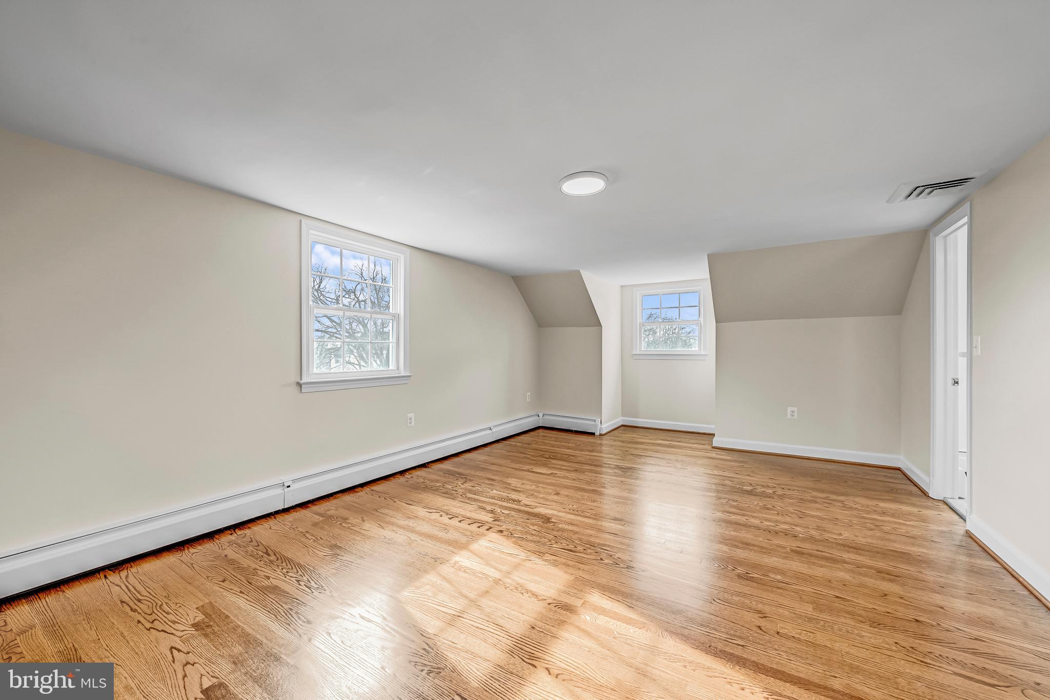 17747 Silcott Springs Road Purcellville, VA 20132 - Photo 29 of 42 a view of an empty room and wooden floor