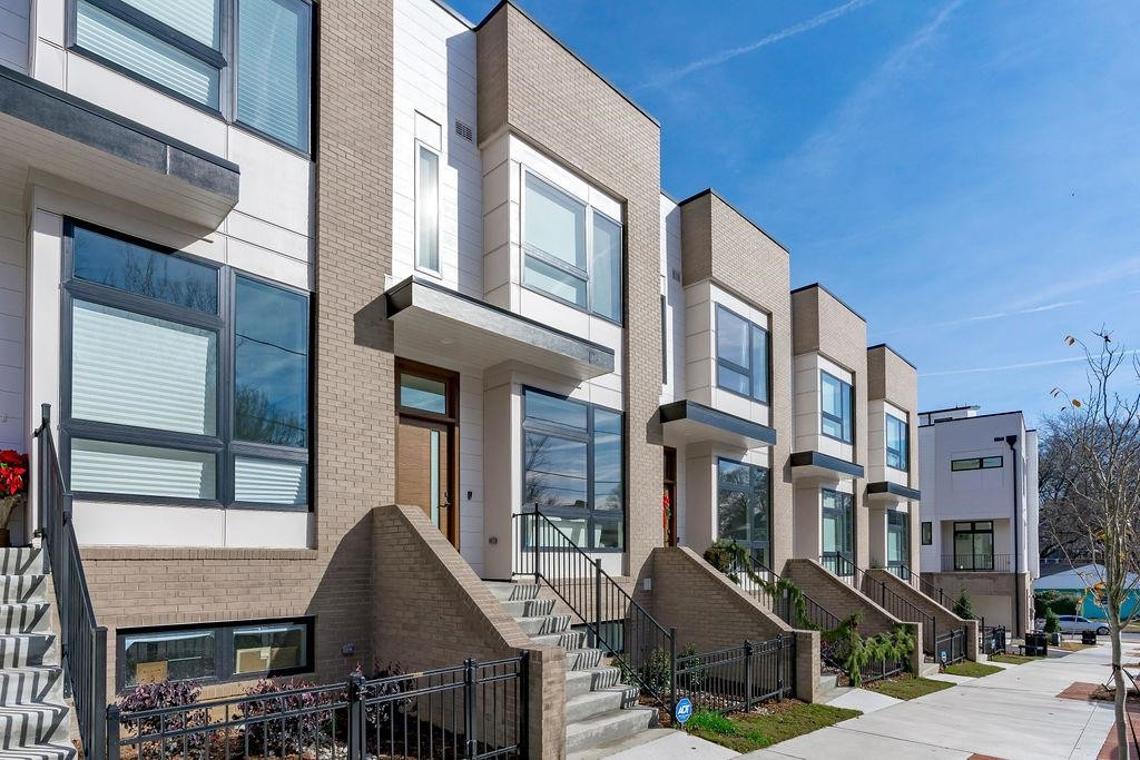 310 Mallard Avenue Durham, NC 27701 - Photo 28 of 41 a front view of a building with street