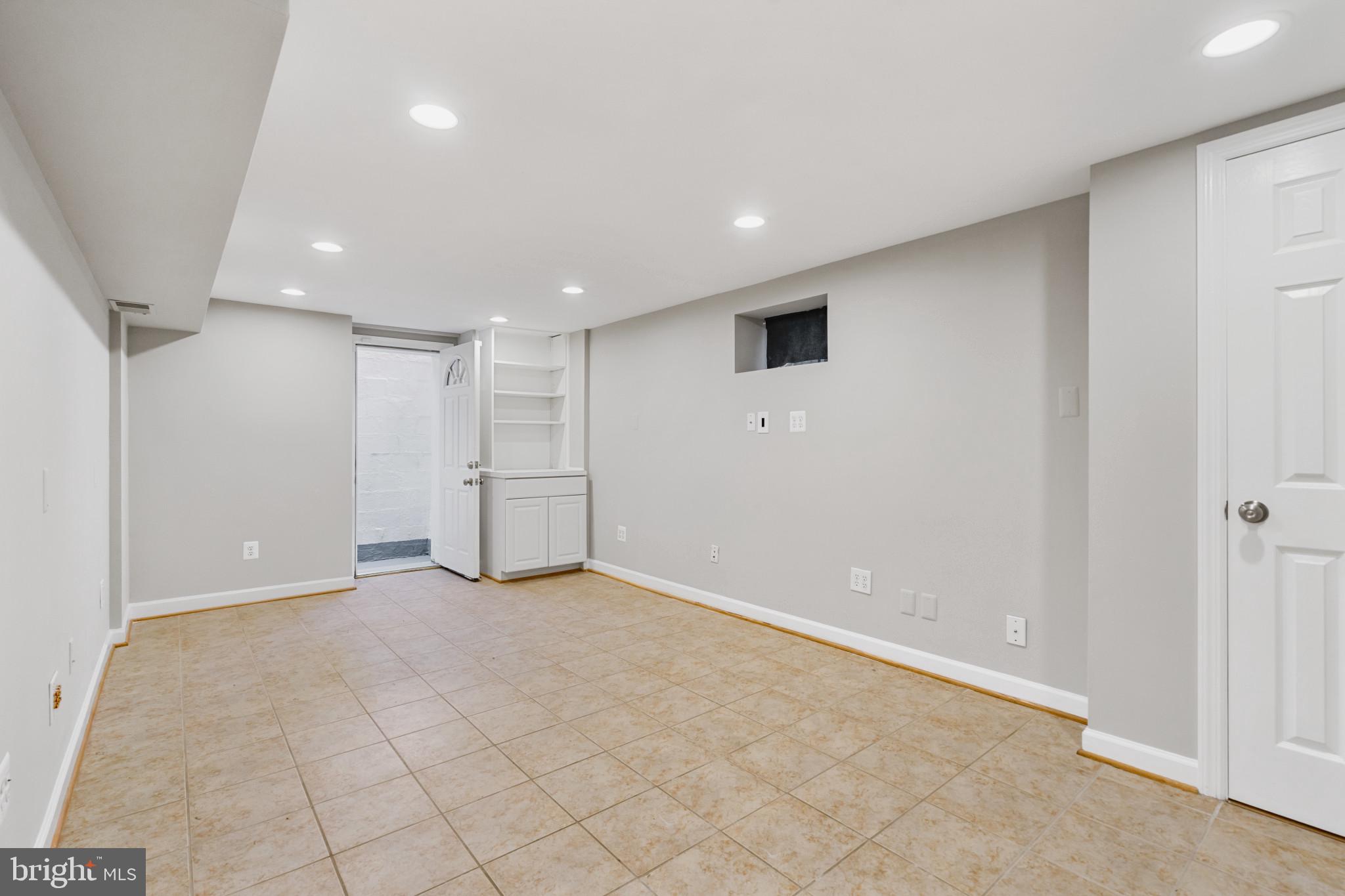 2406 South Arlington Ridge Road Arlington, VA 22202 - Photo 22 of 46 First floor den (with walk out)