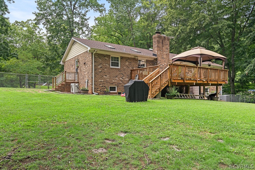9441 Trails End Road Midlothian, VA 23112 - Photo 31 of 40 a view of a house with a yard and sitting area