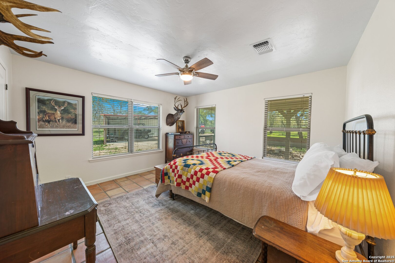 563 J B Road Harper, TX 78631 - Photo 11 of 41 a bedroom with a bed and a window