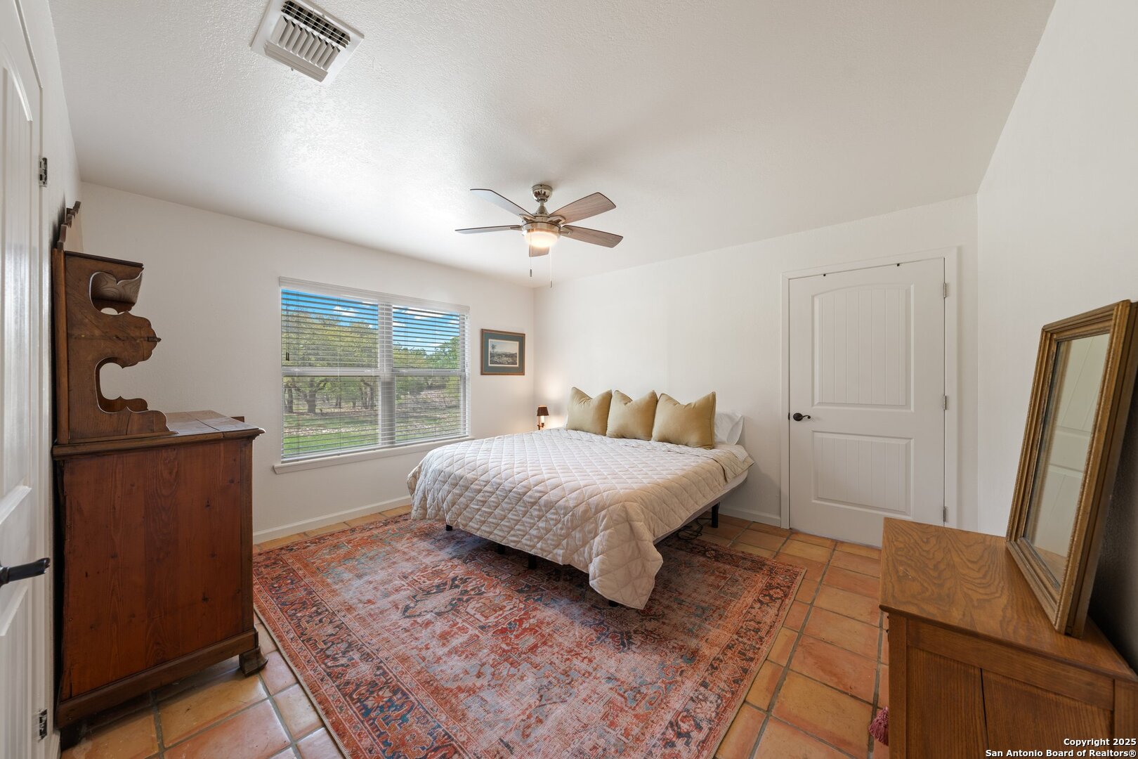 563 J B Road Harper, TX 78631 - Photo 13 of 41 a bedroom with a bed window and a dresser
