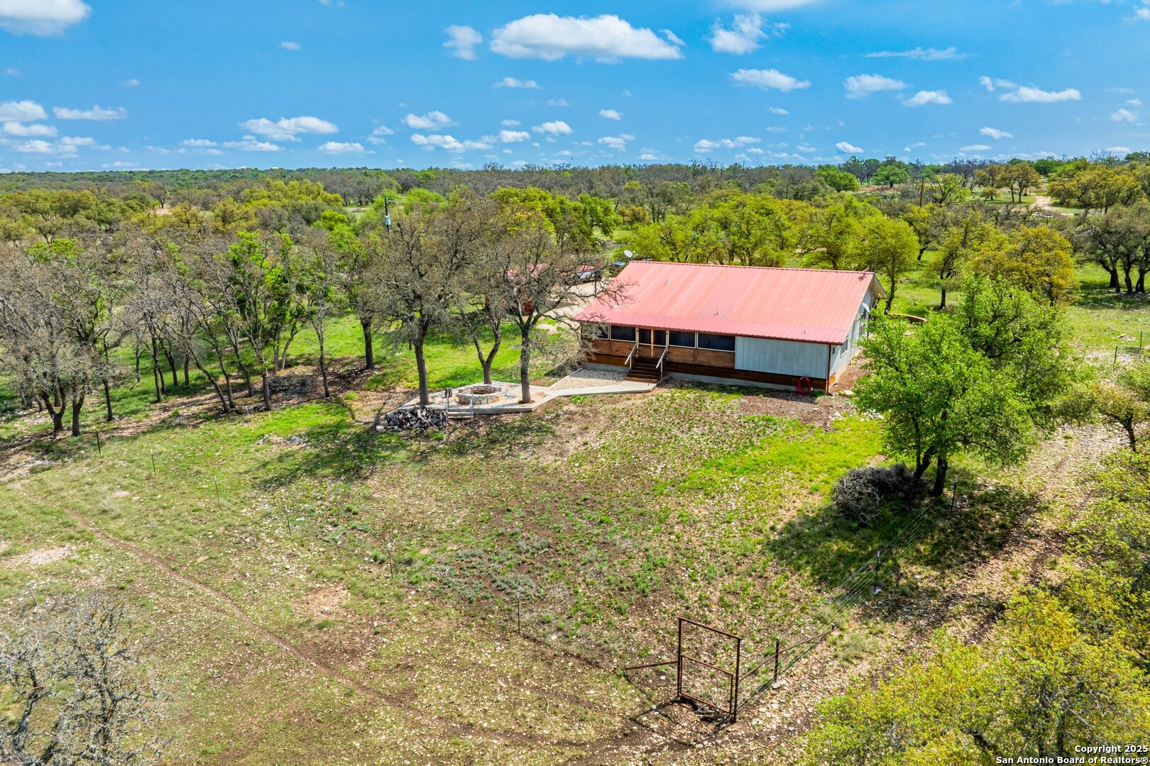 563 J B Road Harper, TX 78631 - Photo 17 of 41 a view of an outdoor space and seating area
