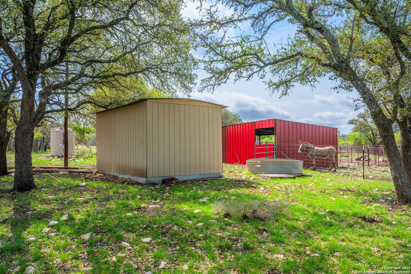 563 J B Road Harper, TX 78631 - Photo 20 of 41 a view of a house with a yard