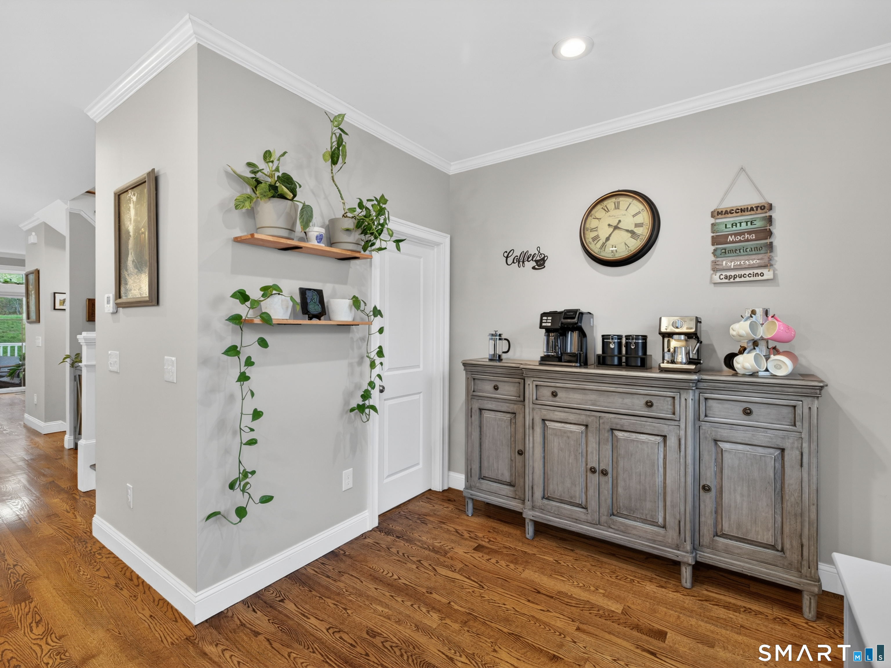 34 Village Crossing, Unit 34 Niantic, CT 06357 - Photo 20 of 38 a living room with granite countertop furniture and a wooden floor