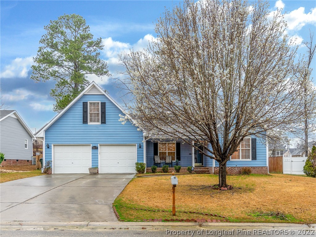 847 Turkey Ridge Drive Fayetteville, NC 28314 - Photo 1 of 31 a front view of a house with a yard