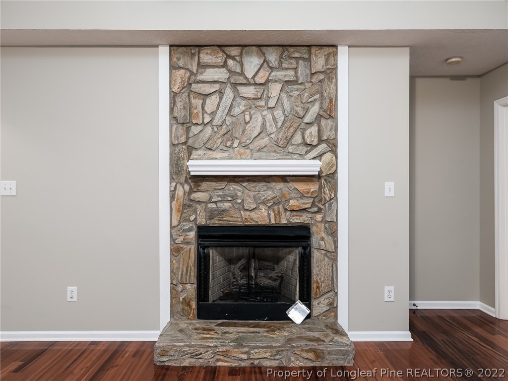 847 Turkey Ridge Drive Fayetteville, NC 28314 - Photo 12 of 31 a living room with a fireplace