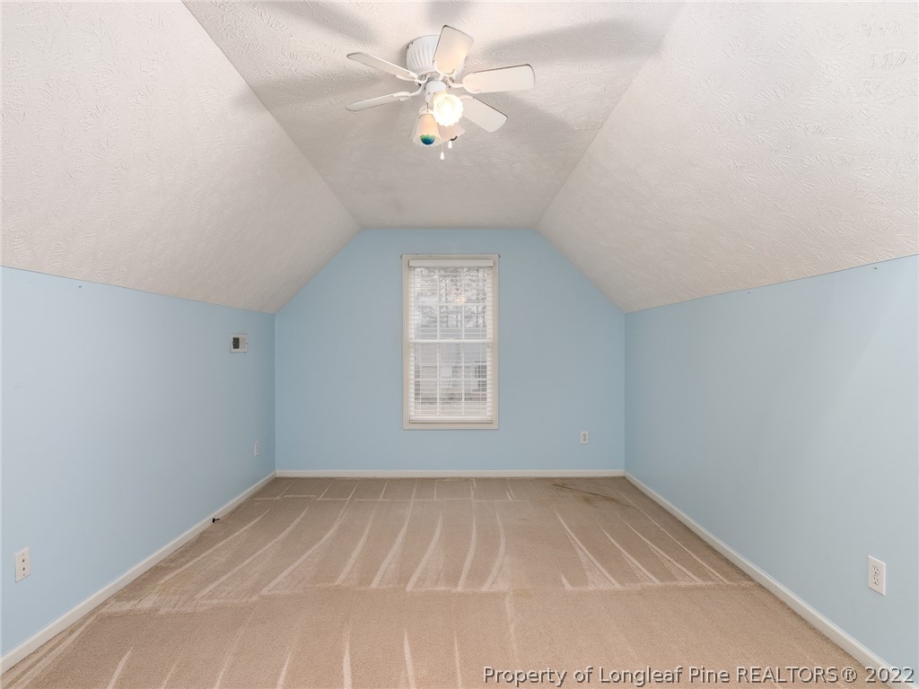 847 Turkey Ridge Drive Fayetteville, NC 28314 - Photo 22 of 31 an empty room with a window and a fan