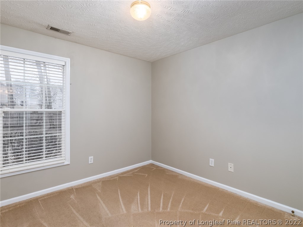 847 Turkey Ridge Drive Fayetteville, NC 28314 - Photo 31 of 31 a view of an empty room with a window