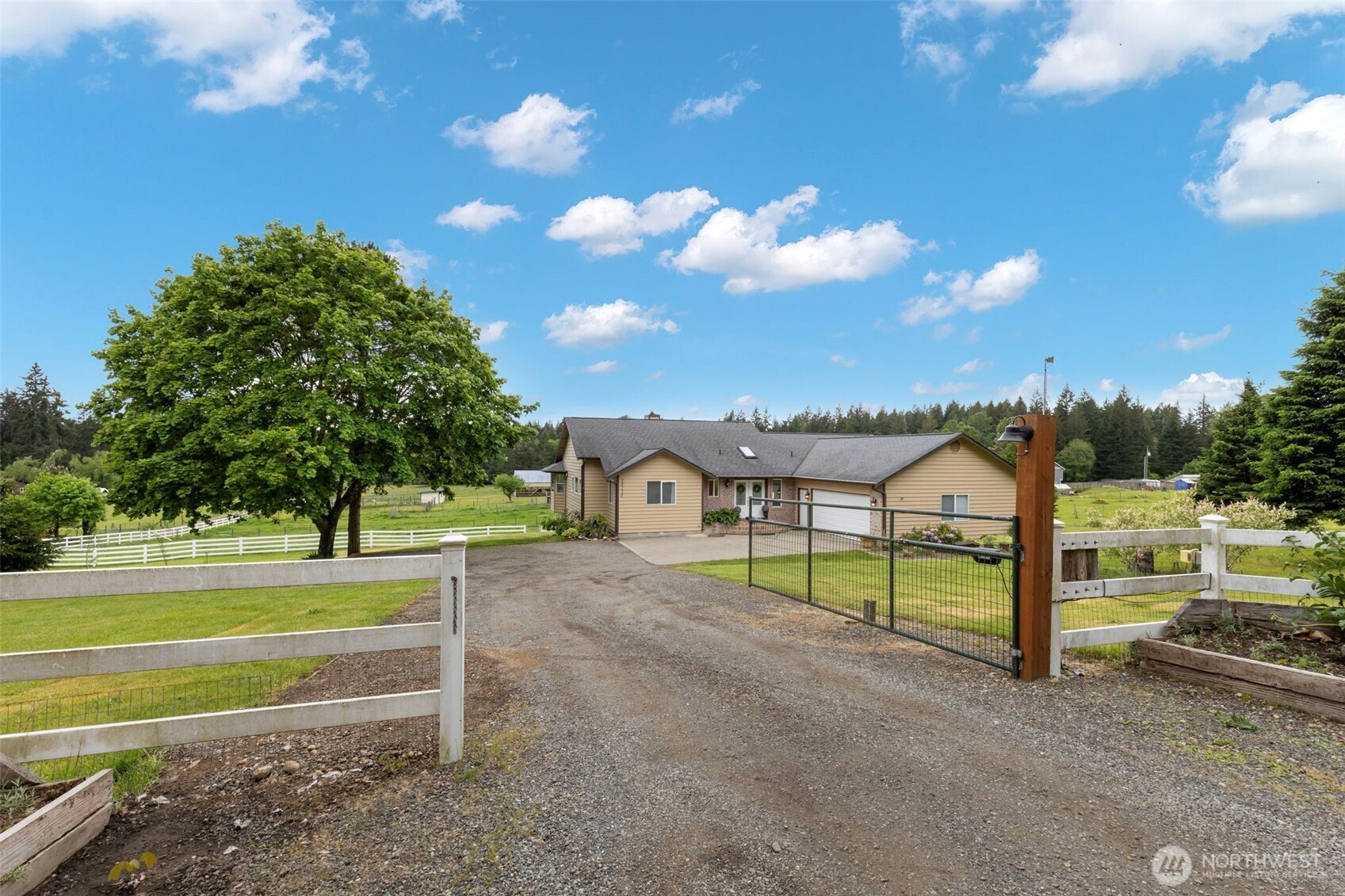 14110 Glenwood Road Southwest Port Orchard, WA 98367 - Photo 36 of 40 a view of a house with a big yard