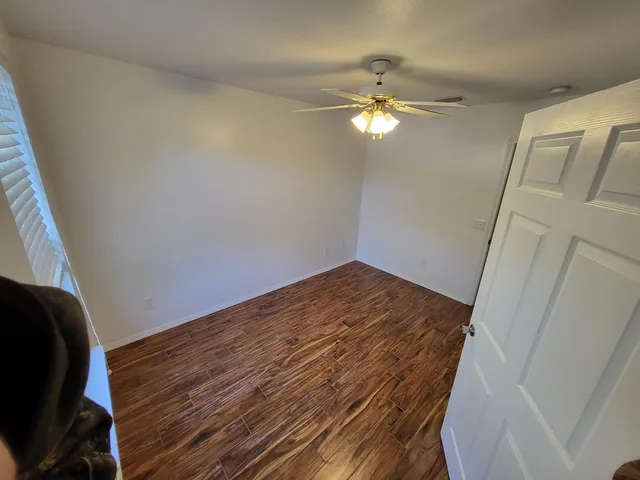 an empty room with windows