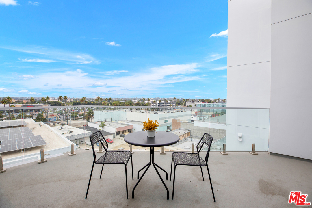 13448 Beach Avenue, Unit PH7314 Marina del Rey, CA 90292 - Photo 9 of 22 a view of a terrace with furniture and stove