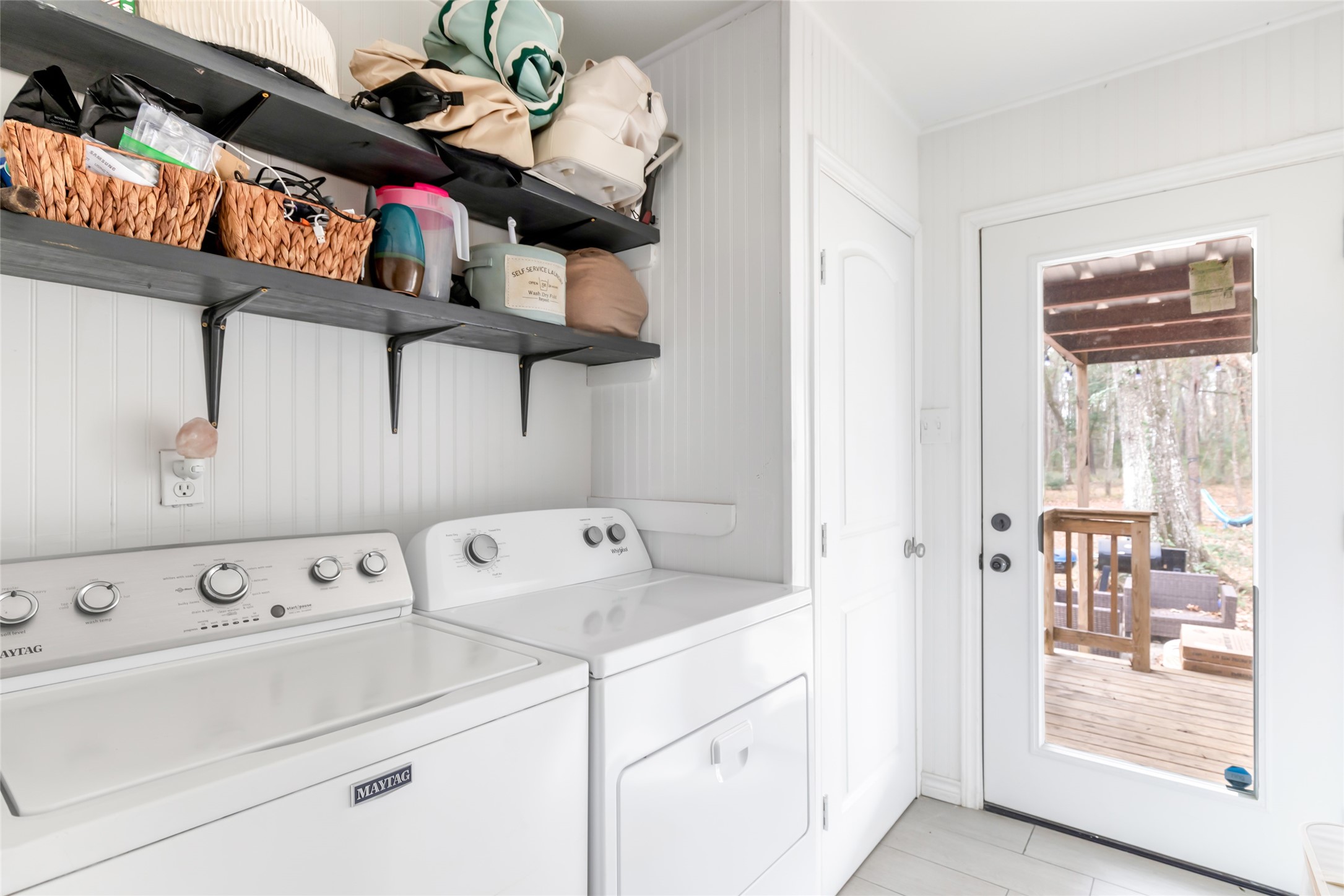 9660 Fostoria Road Cleveland, TX 77328 - Photo 25 of 31 a utility room with dryer and washer