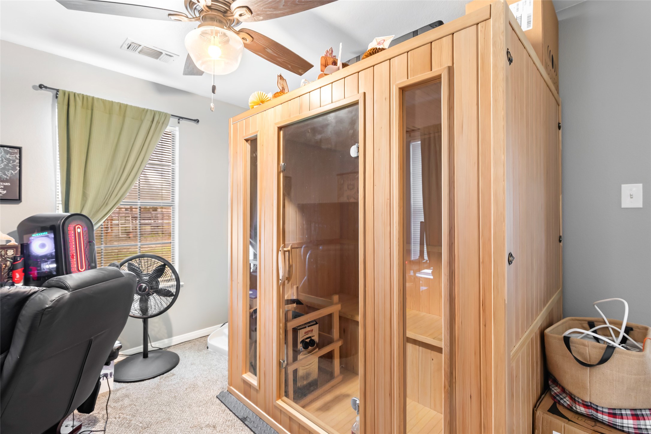 9660 Fostoria Road Cleveland, TX 77328 - Photo 30 of 31 a view of a livingroom with furniture and windows