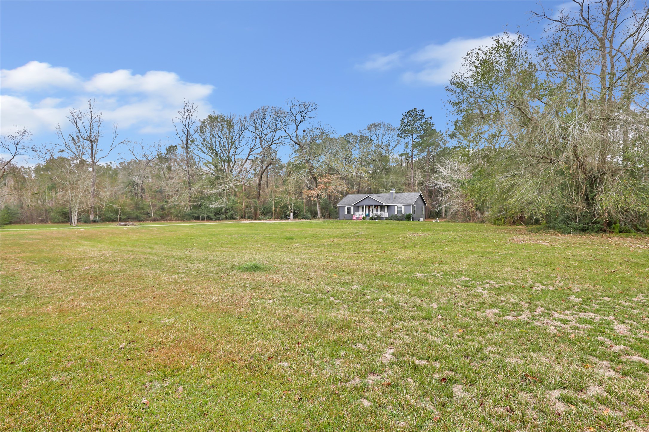 9660 Fostoria Road Cleveland, TX 77328 - Photo 5 of 31 a view of a field with an ocean