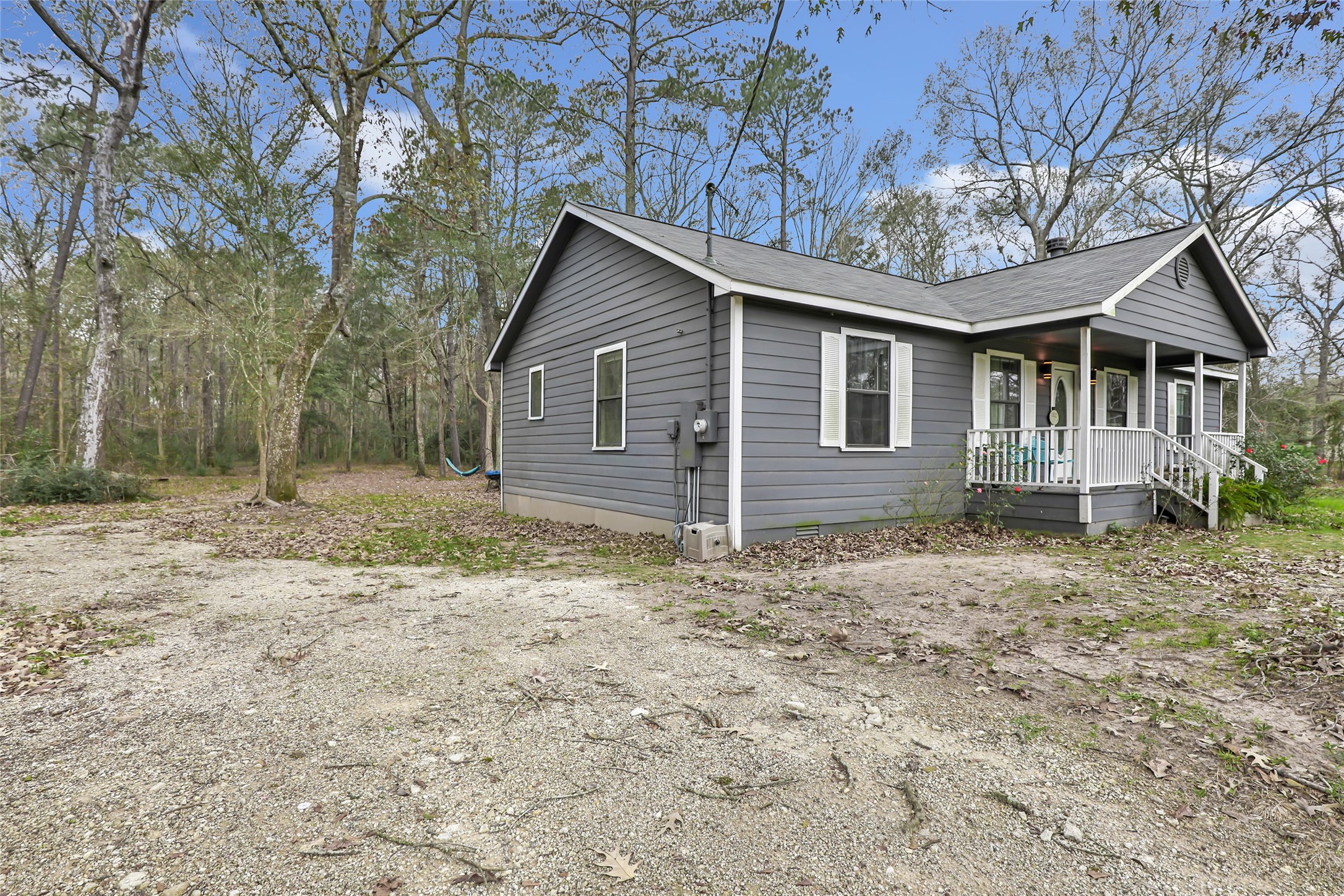 9660 Fostoria Road Cleveland, TX 77328 - Photo 8 of 31 a view of a house with a yard